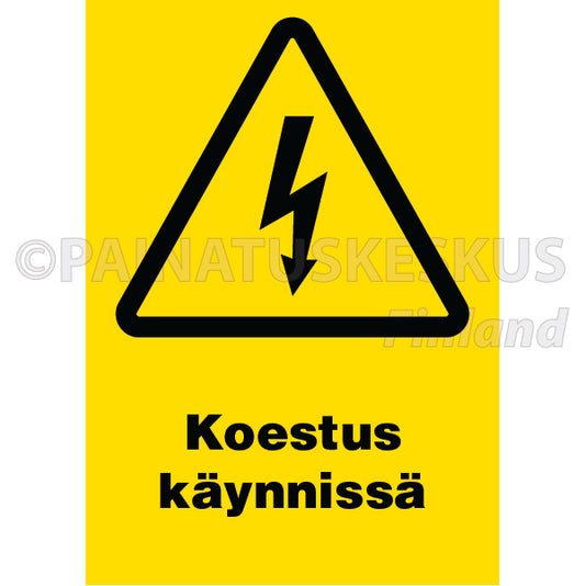 Koestus käynnissä -sähköalan merkki